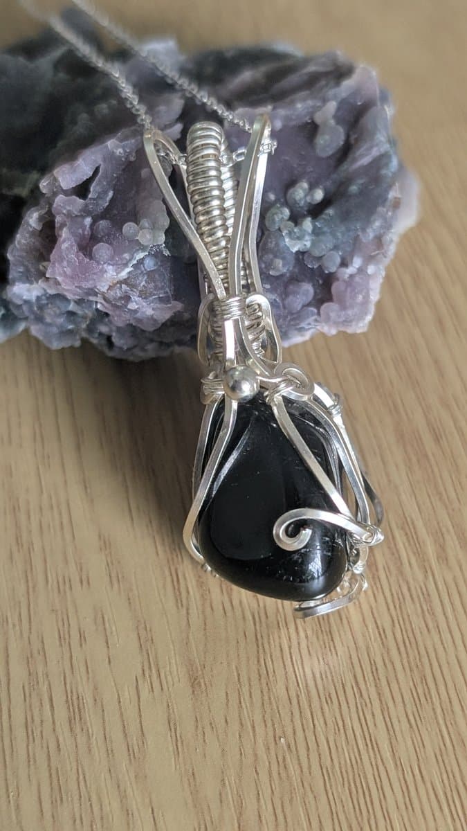 black tourmaline pendant in silver-plated copper by Loutan Beauty